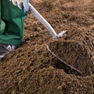 Digging Rolawn topsoil